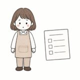 お店の人と書類（カードの売上票の記事）