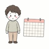 カレンダーを前に立つ人（カードを1年滞納するとどうなるかの記事）